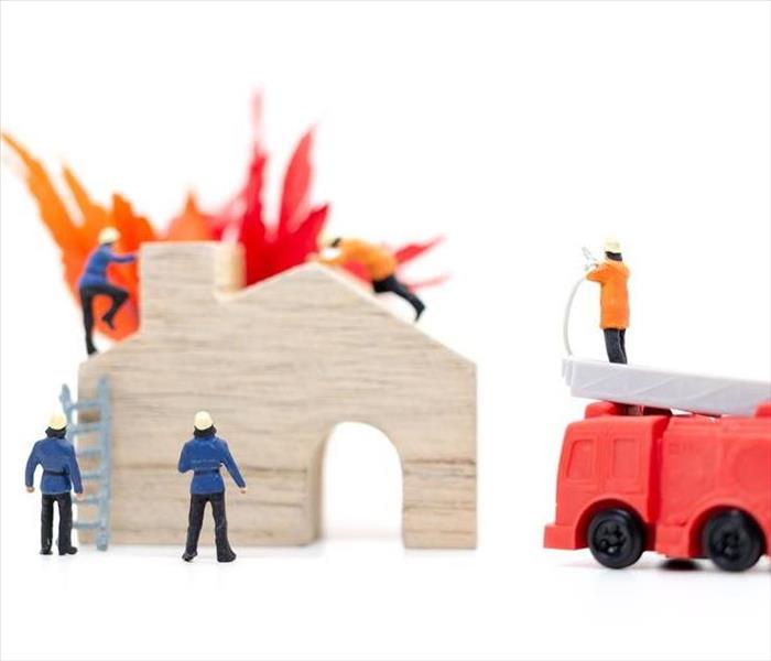 Toy firefighters with house and fire
